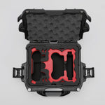 Top view of DJI Neo Black Color Adventure Ready Compact Waterproof Carry-on Case and Custom Foam Insert with a Red Layer for DJI Neo