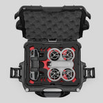 Top view of DJI Neo Black Color Adventure Ready Compact Waterproof Carry-on Case and Custom Foam Insert with a Red Layer, holding the DJI Neo Combo