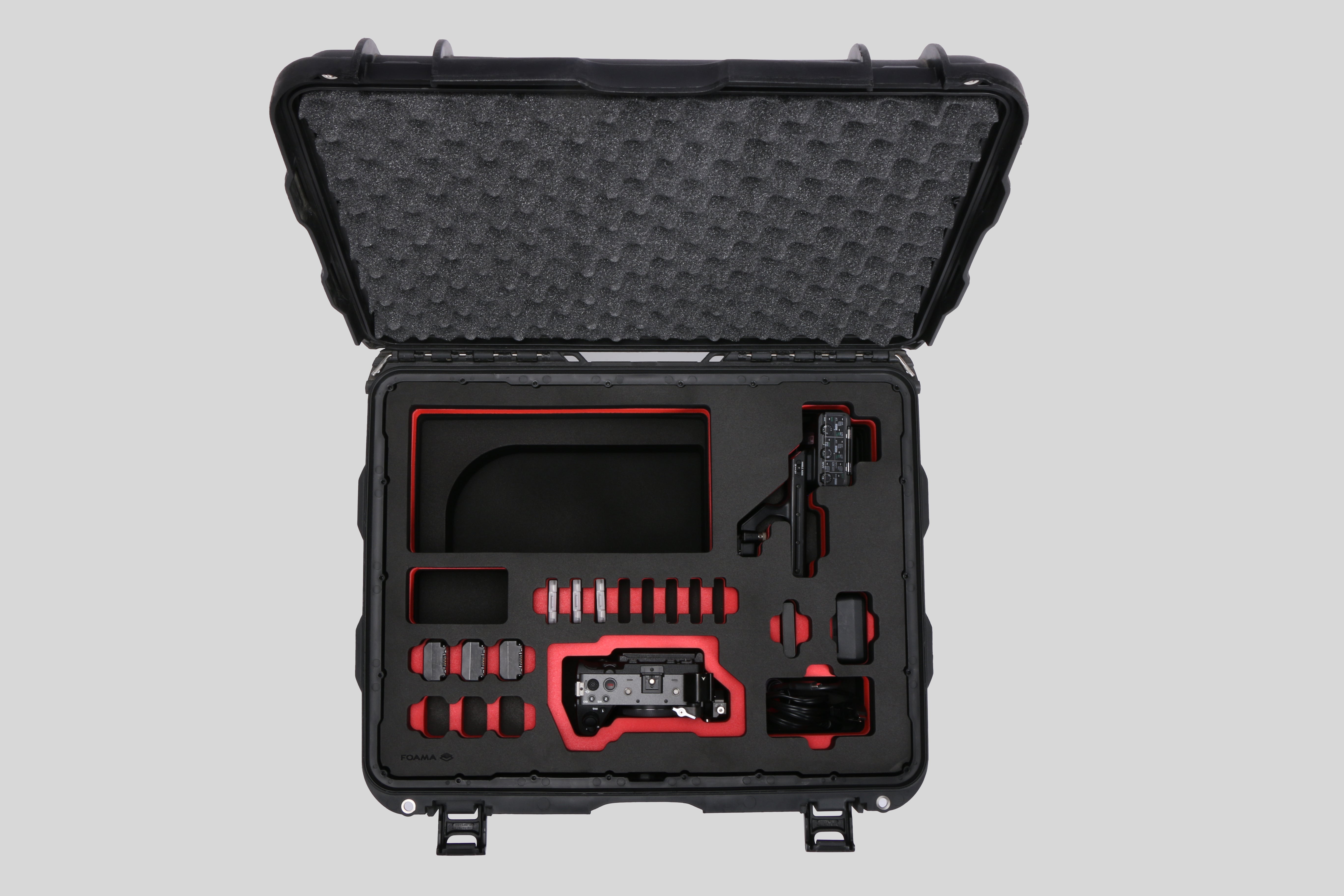 Top view of Sony FX3 and accessories in Black Color Studio Case and Custom Foam Insert with a red layer