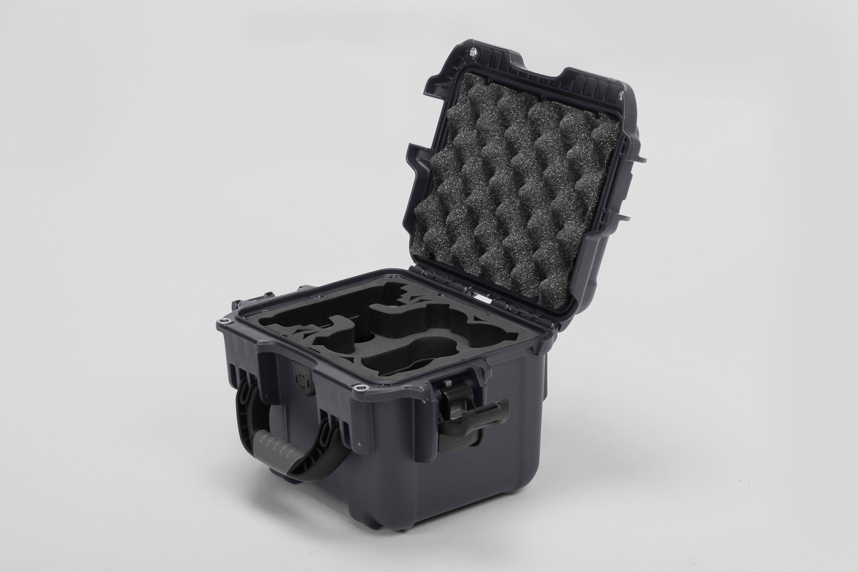 Angled view of DJI Neo Graphite Color Adventure Ready Compact Waterproof Carry-on Case and Black Custom Foam Insert