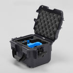 Angled view of DJI Neo Graphite Color Adventure Ready Compact Waterproof Carry-on Case and Custom Foam Insert with a Blue Layer for DJI Neo