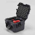 Angled view of DJI Neo Graphite Color Adventure Ready Compact Waterproof Carry-on Case and Custom Foam Insert with a Red Layer for DJI Neo