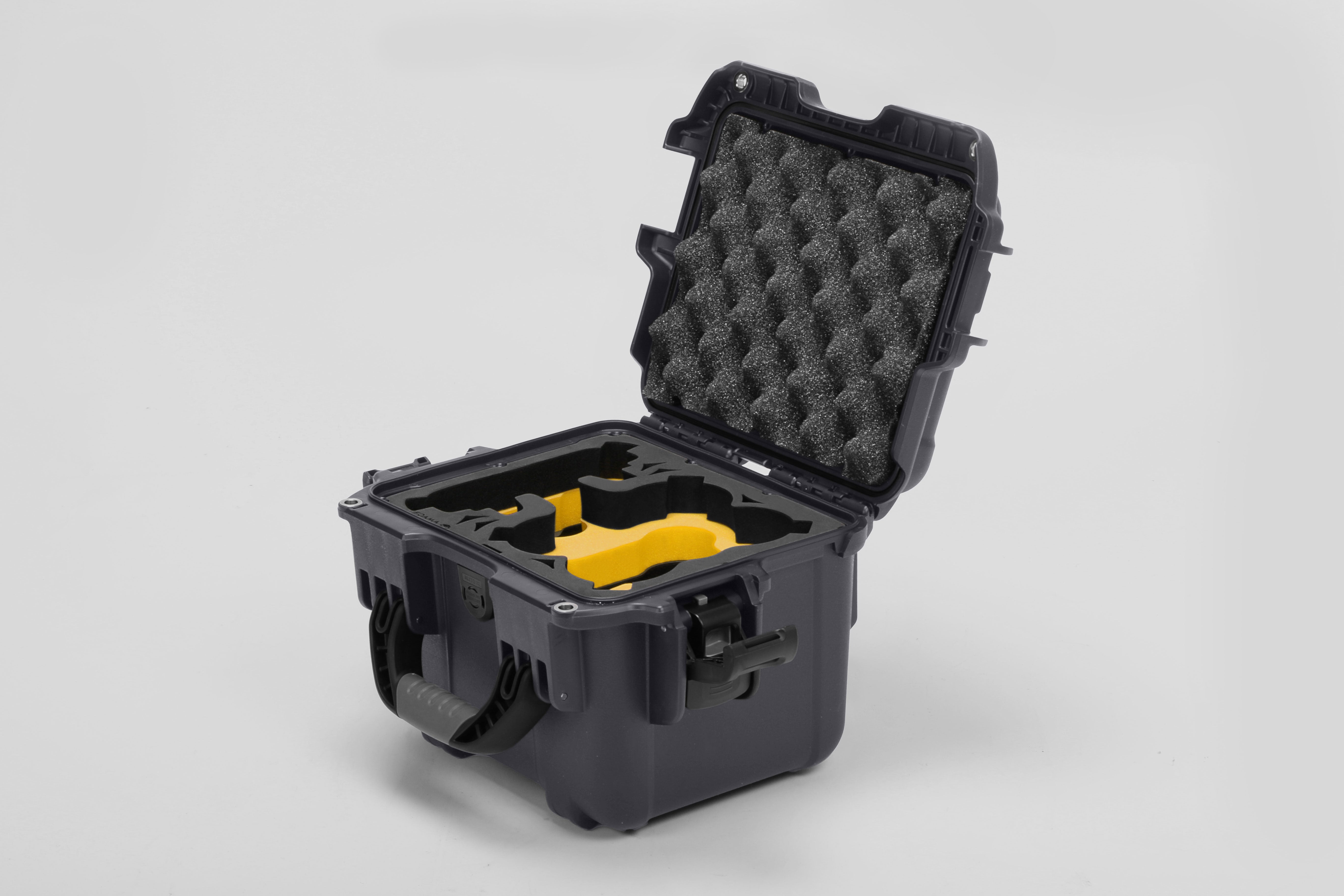 Angled view of DJI Neo Graphite Color Adventure Ready Compact Waterproof Carry-on Case and Custom Foam Insert with a Yellow Layer for DJI Neo