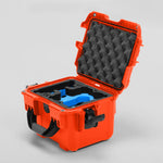 Angled view of DJI Neo Orange Color Adventure Ready Compact Waterproof Carry-on Case and Custom Foam Insert with a Blue Layer for DJI Neo Combo