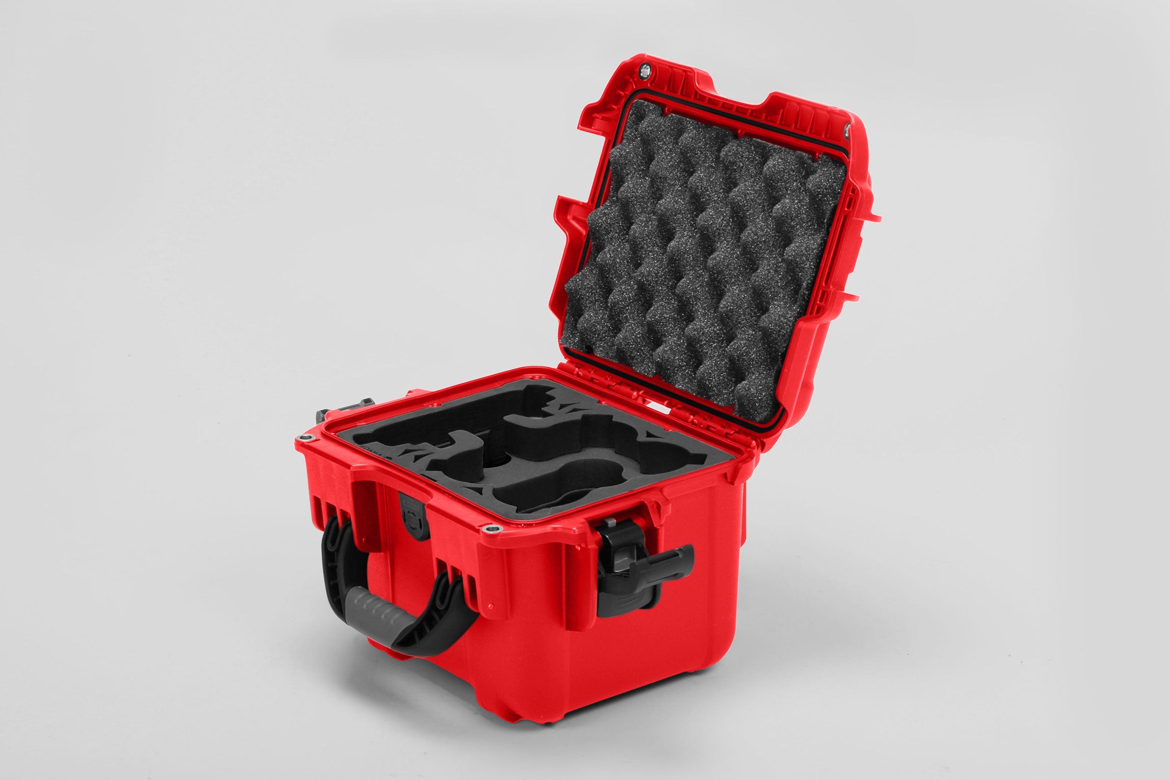Angled view of DJI Neo Red Color Adventure Ready Compact Waterproof Carry-on Case and Black Custom Foam Insert