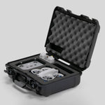 Angled view of Foama black all-weather carry-on case with stylish blue layer insert, holding DJI Neo