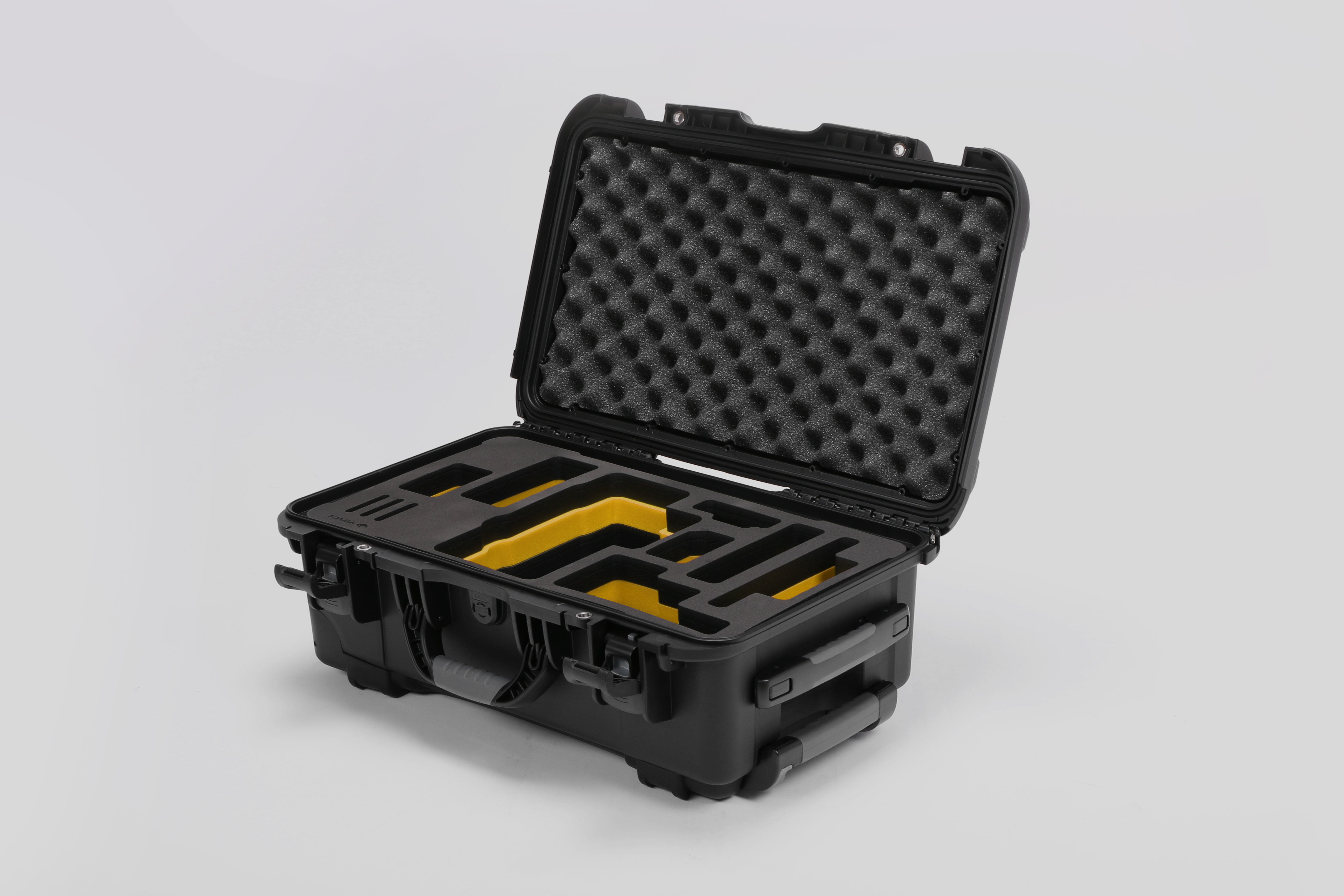 Angled view of Foama Black Color Travel Case and Custom Foam Insert with Yellow Layer for RED Monstro