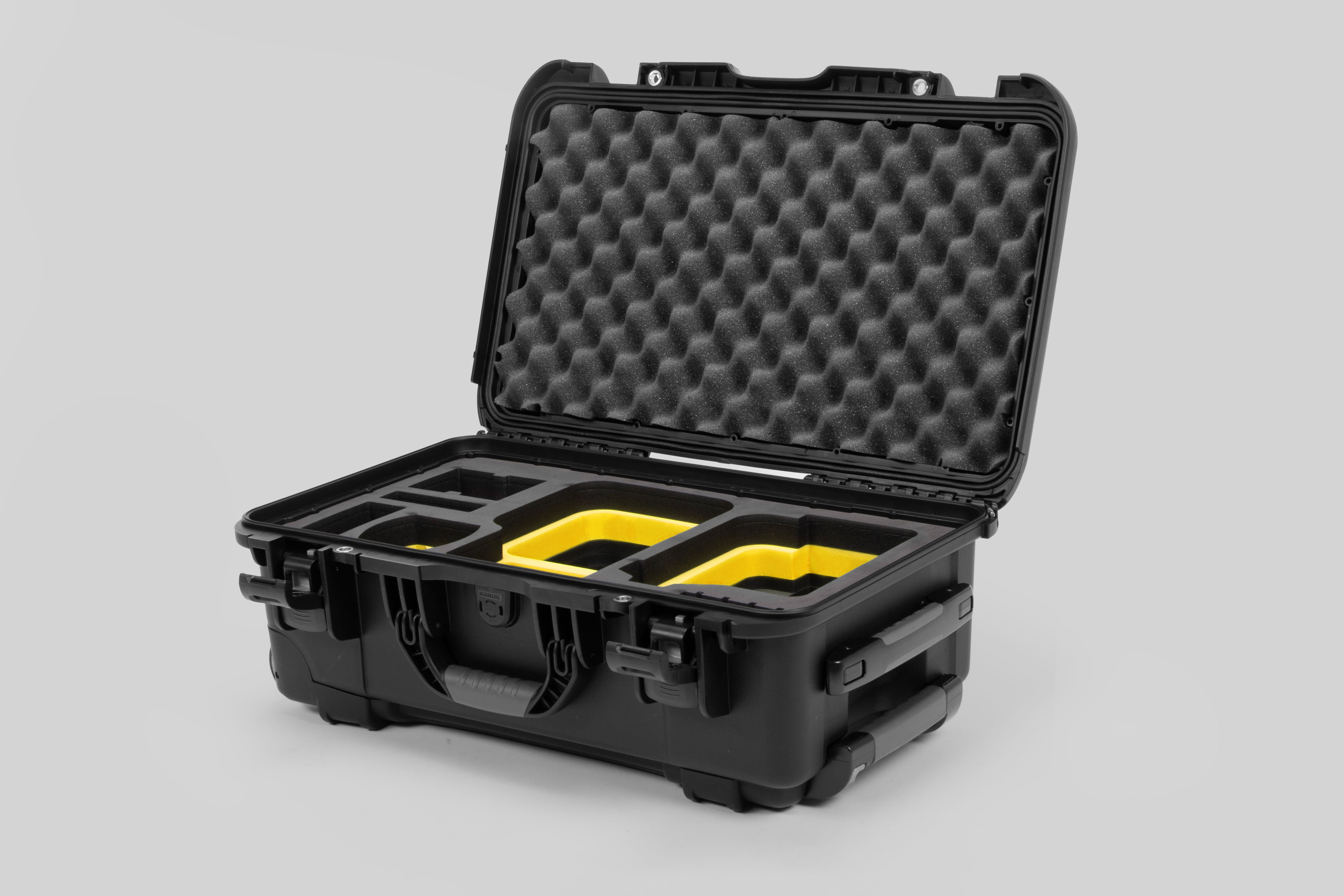 Angle view of Black Color Canon C400 Camera Carry-on Case and Yellow Layer Custom Foam Insert