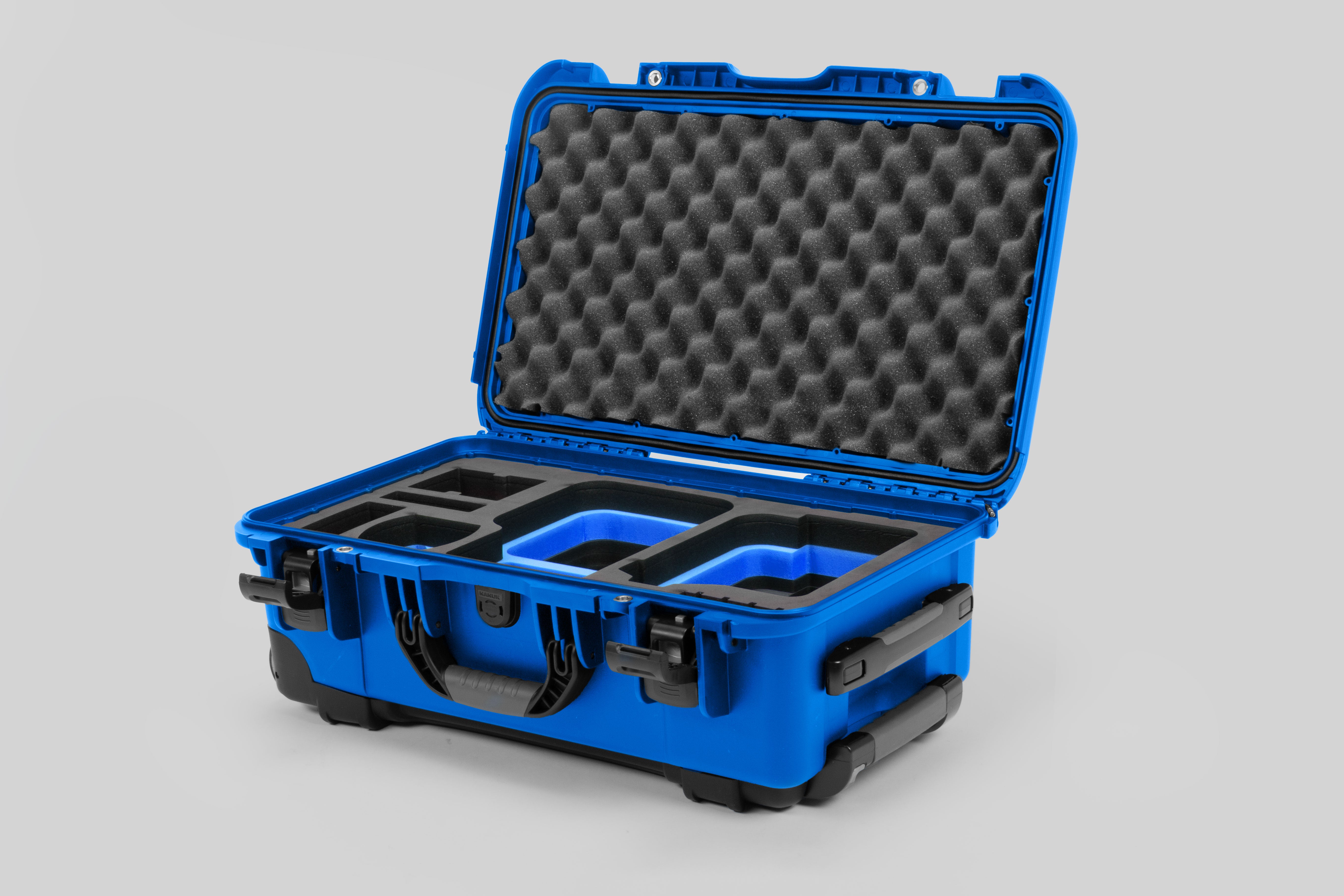 Angle view of Blue Color Canon C400 Camera Carry-on Case and Blue Layer Custom Foam Insert