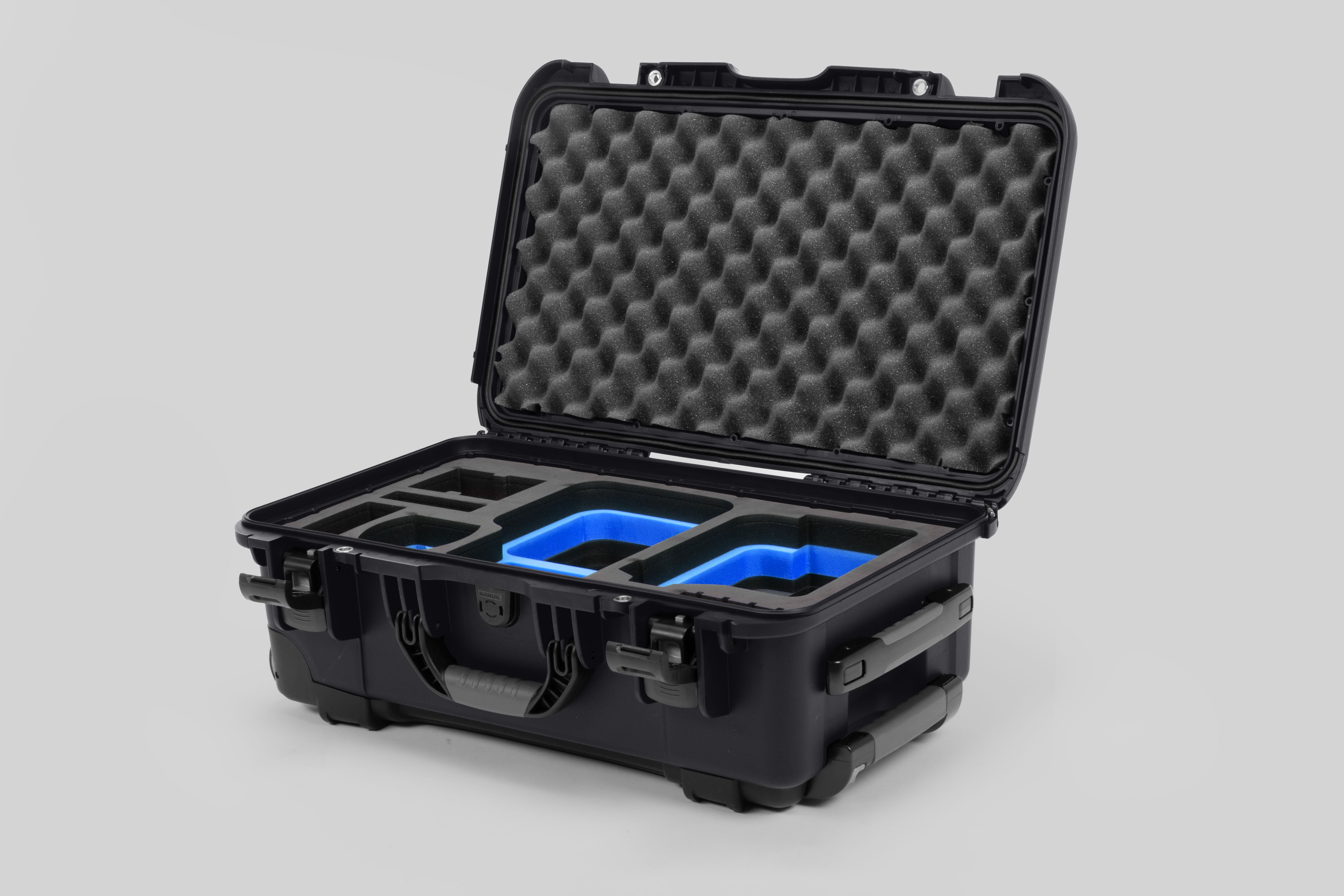 Angle view of Graphite Color Canon C400 Camera Carry-on Case and Blue Layer Custom Foam Insert