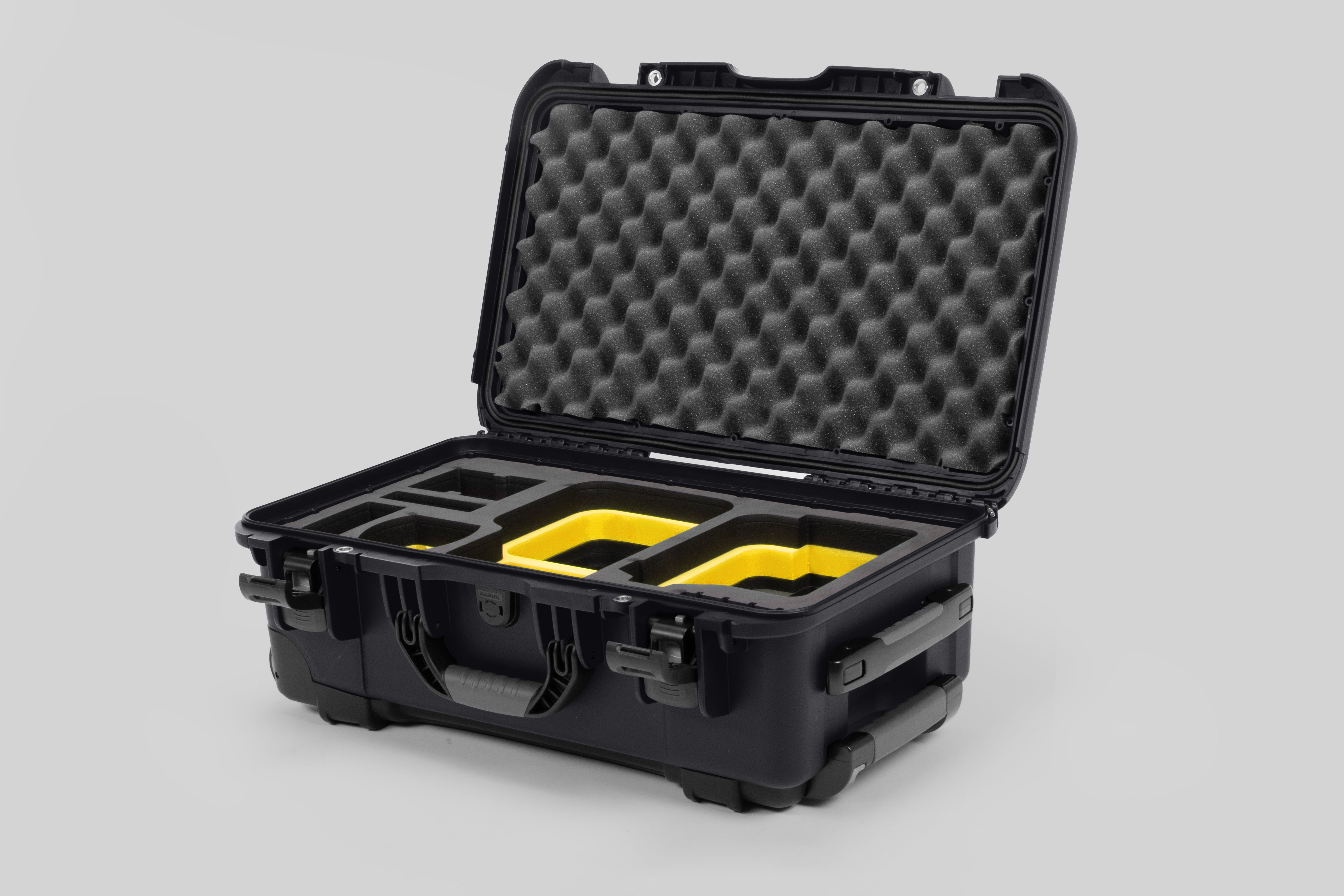 Angle view of Graphite Color Canon C400 Camera Carry-on Case and Yellow Layer Custom Foam Insert