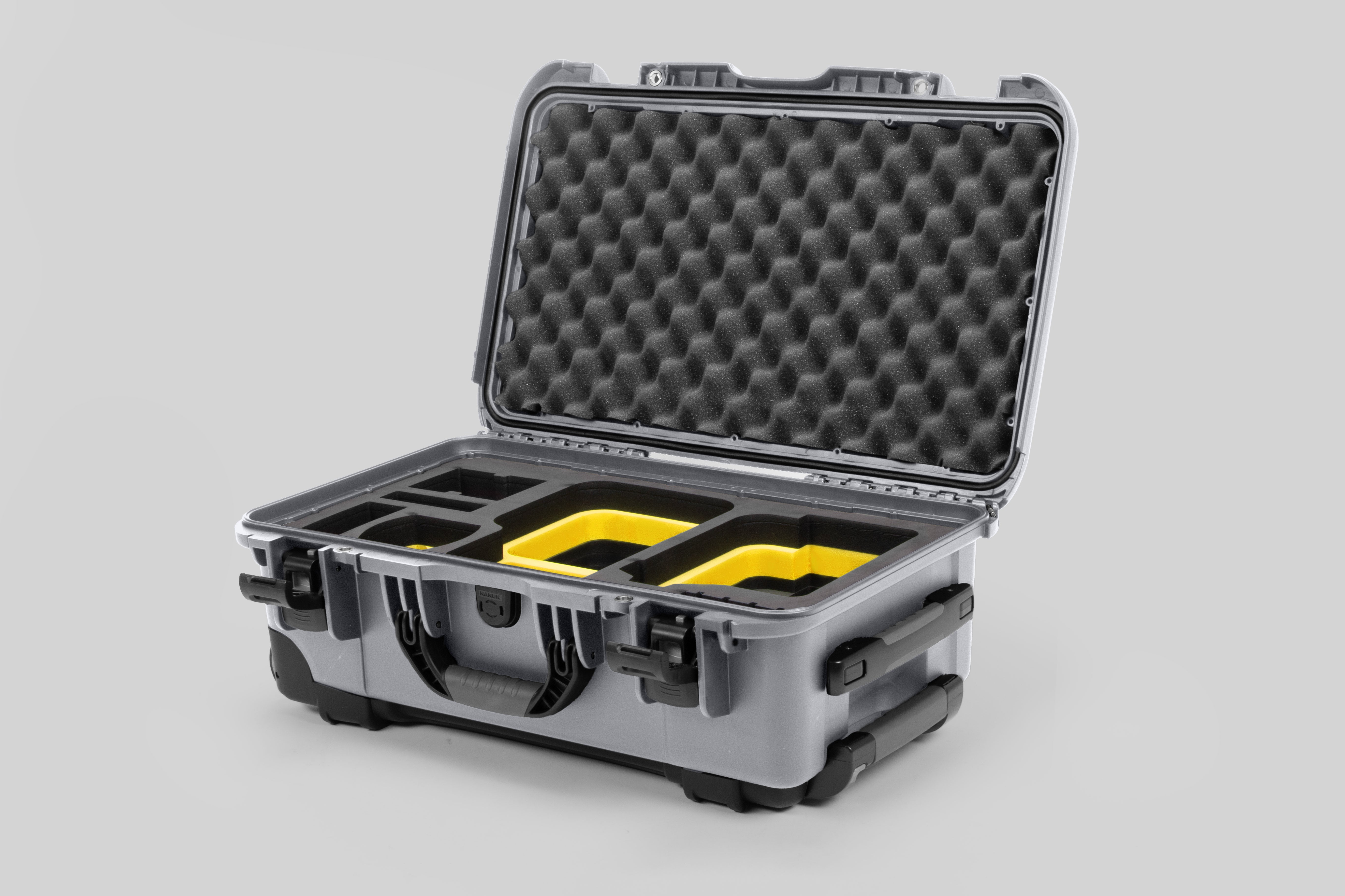 Angle view of Silver Color Canon C400 Camera Carry-on Case and Yellow Layer Custom Foam Insert