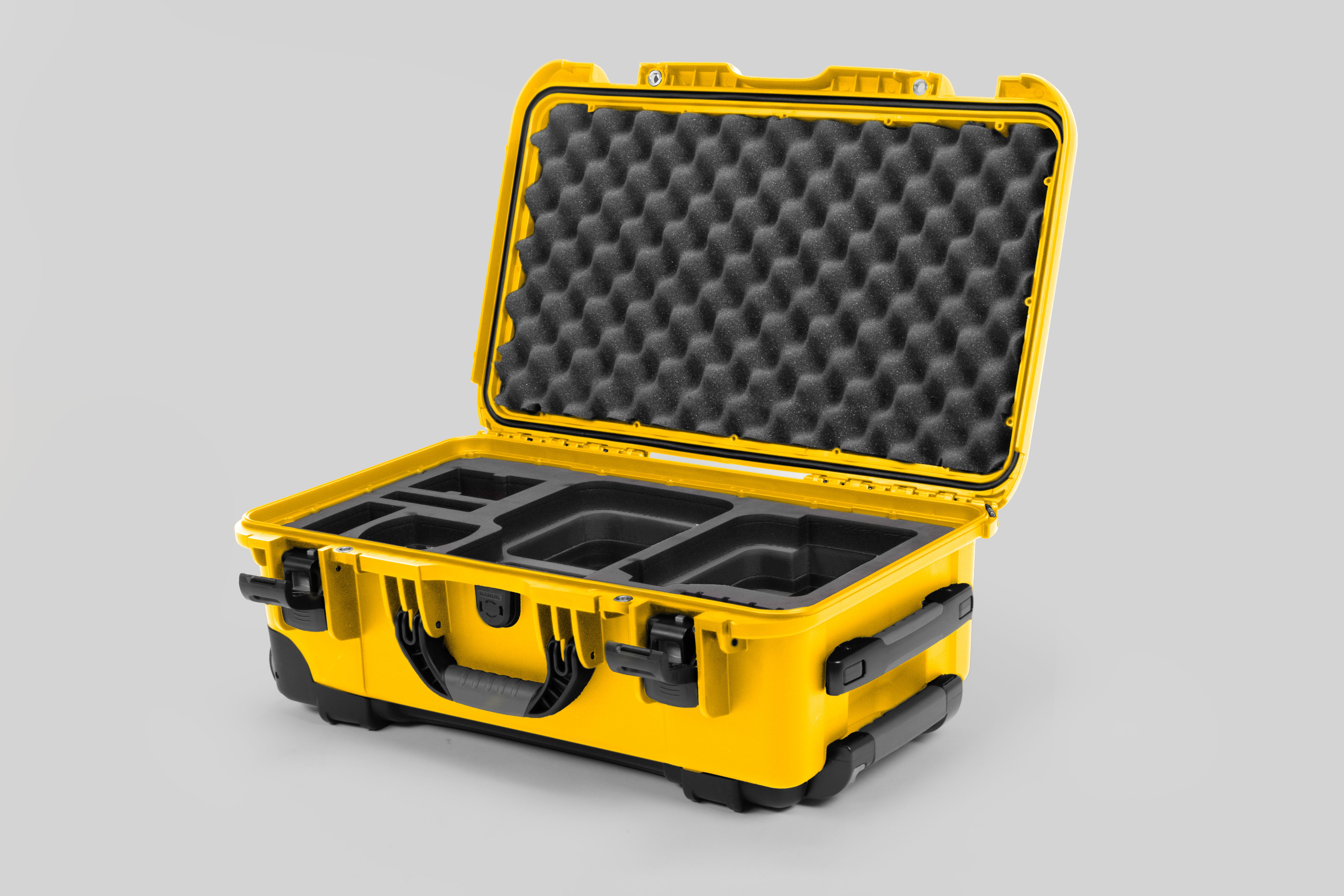 Angle view of Yellow Color Canon C400 Camera Carry-on Case and Black Layer Custom Foam Insert