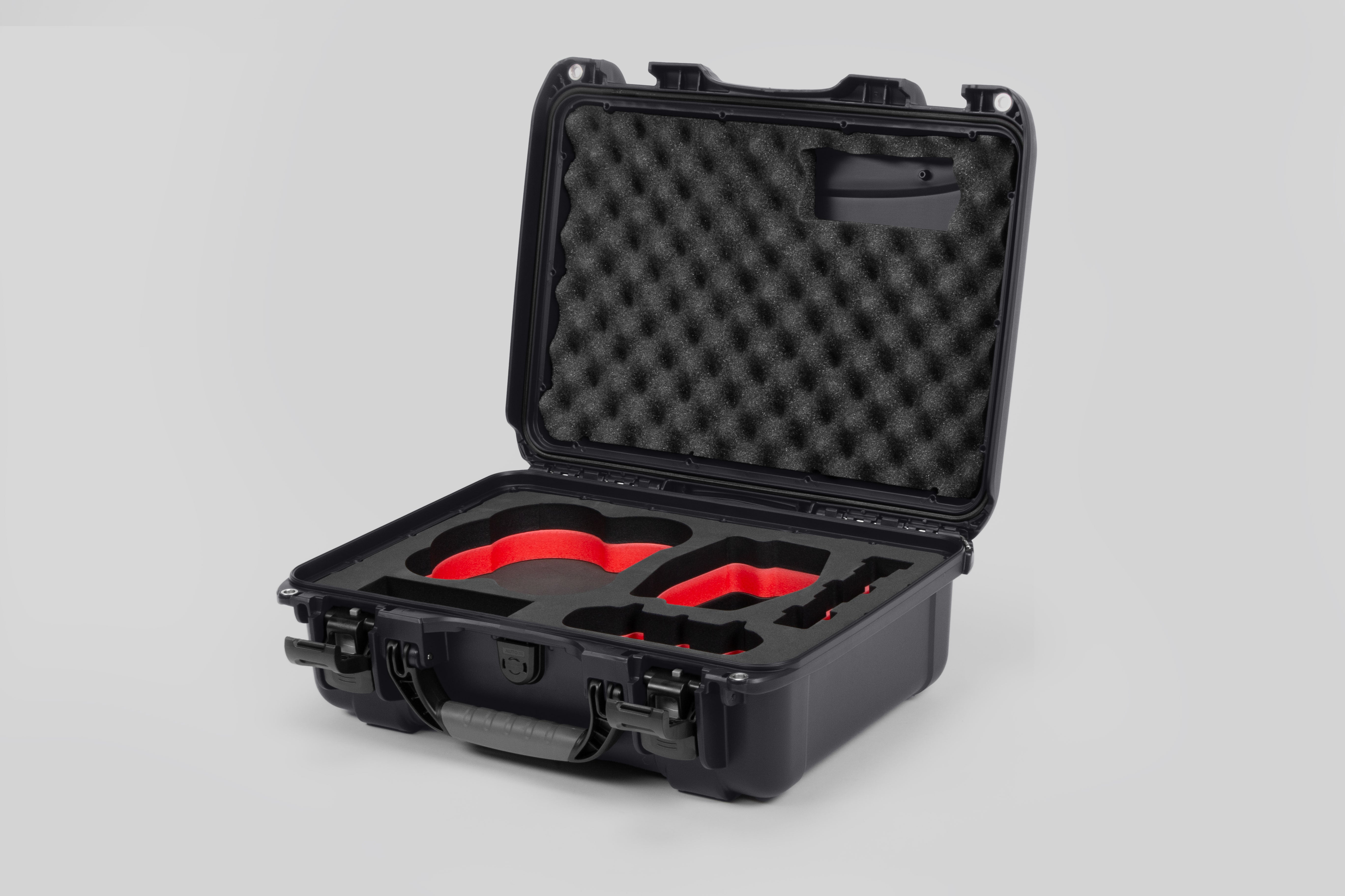 Angled view of DJI Avata 2 Fly More Combo Graphite Color Waterproof Hard Case and Custom Foam Insert with a Red Layer