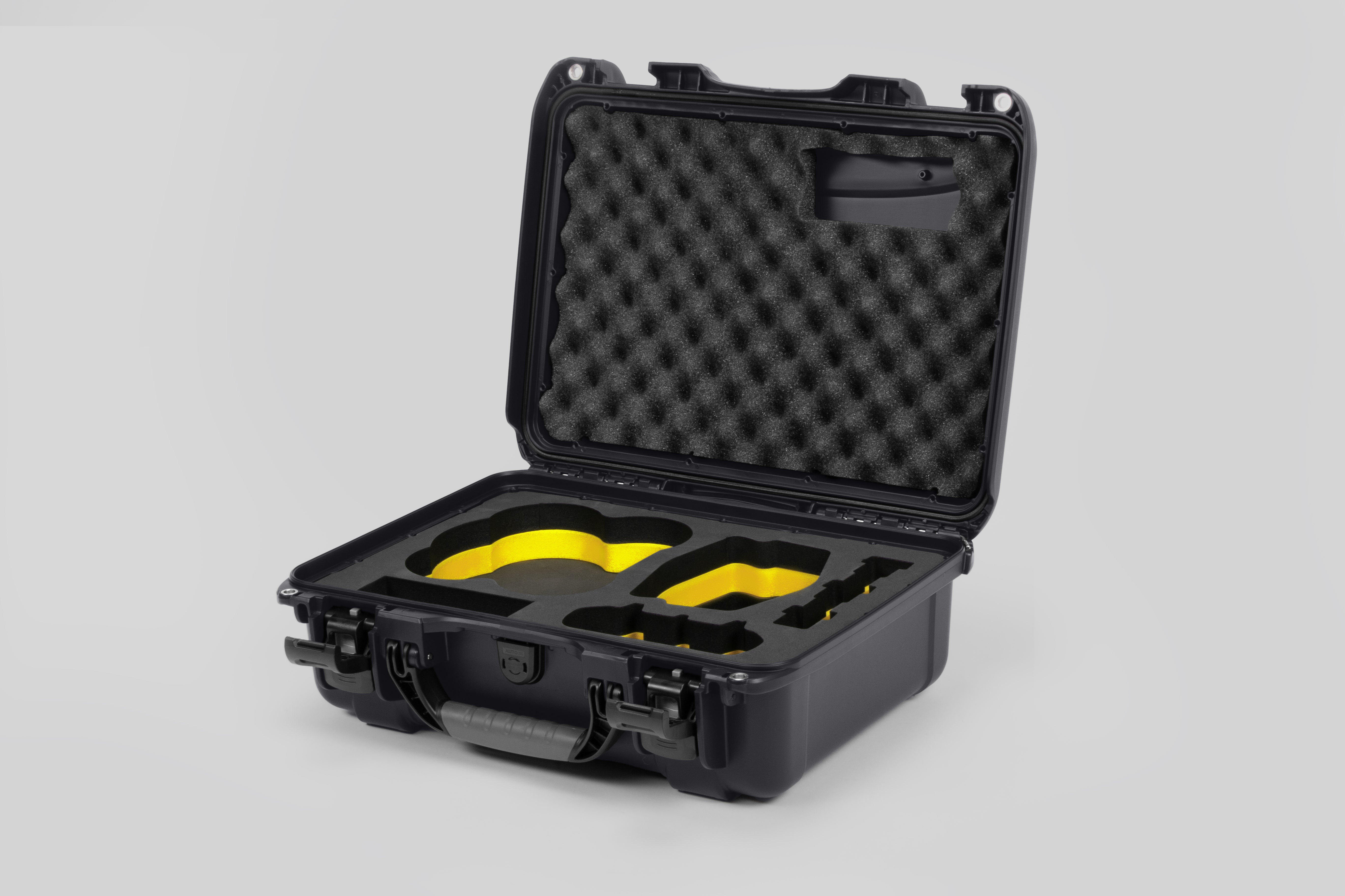 Angled view of DJI Avata 2 Fly More Combo Graphite Color Waterproof Hard Case and Custom Foam Insert with a Yellow Layer