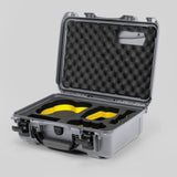 Angled view of DJI Avata 2 Fly More Combo Silver Color Waterproof Hard Case and Custom Foam Insert with a Yellow Layer