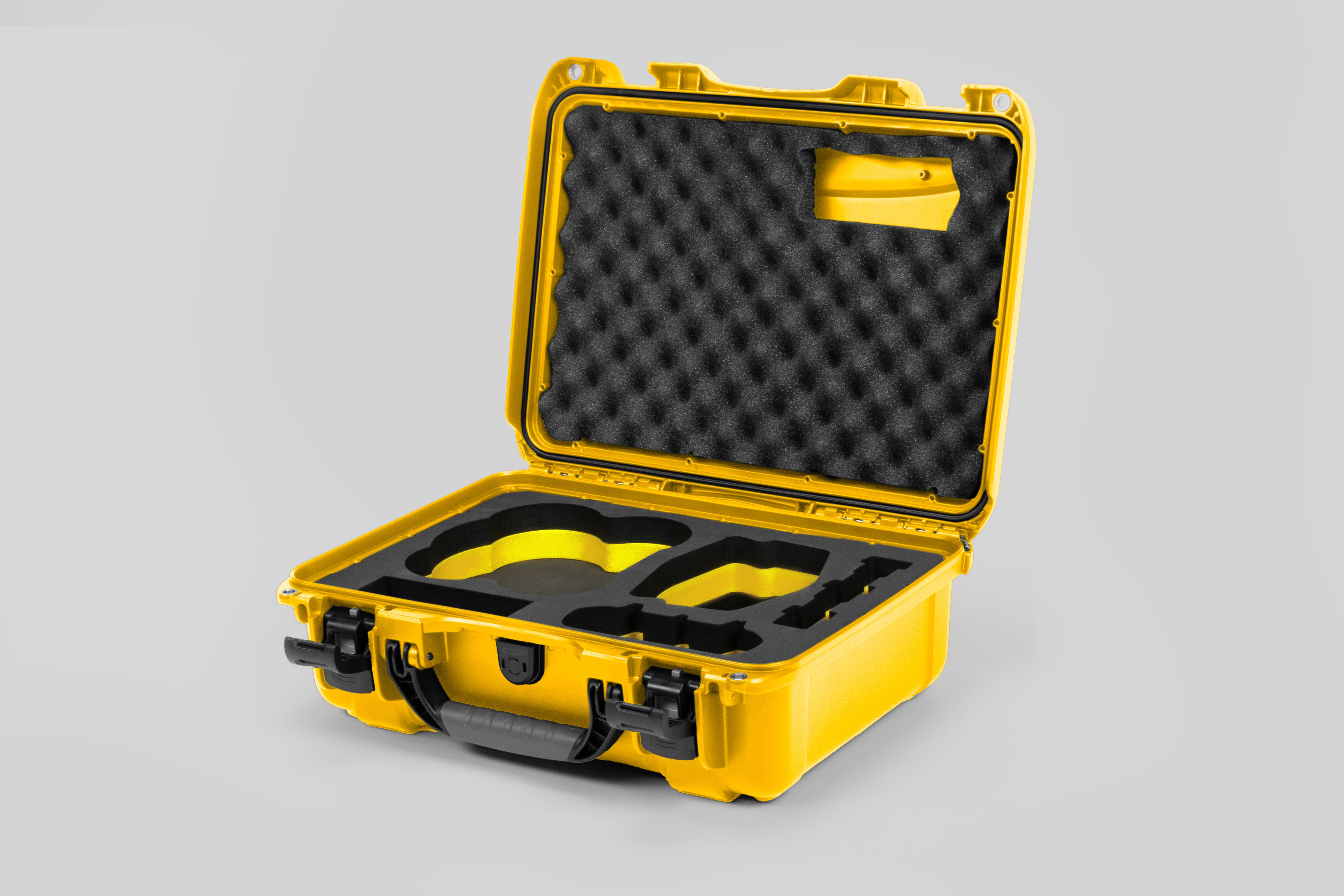 Angled view of DJI Avata 2 Fly More Combo Yellow Color Waterproof Hard Case and Custom Foam Insert with a Yellow Layer