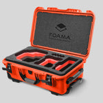 Angled view of Foama Orange Color Carry-on case and Custom Foam Insert with Red Layer for RED Komodo-X