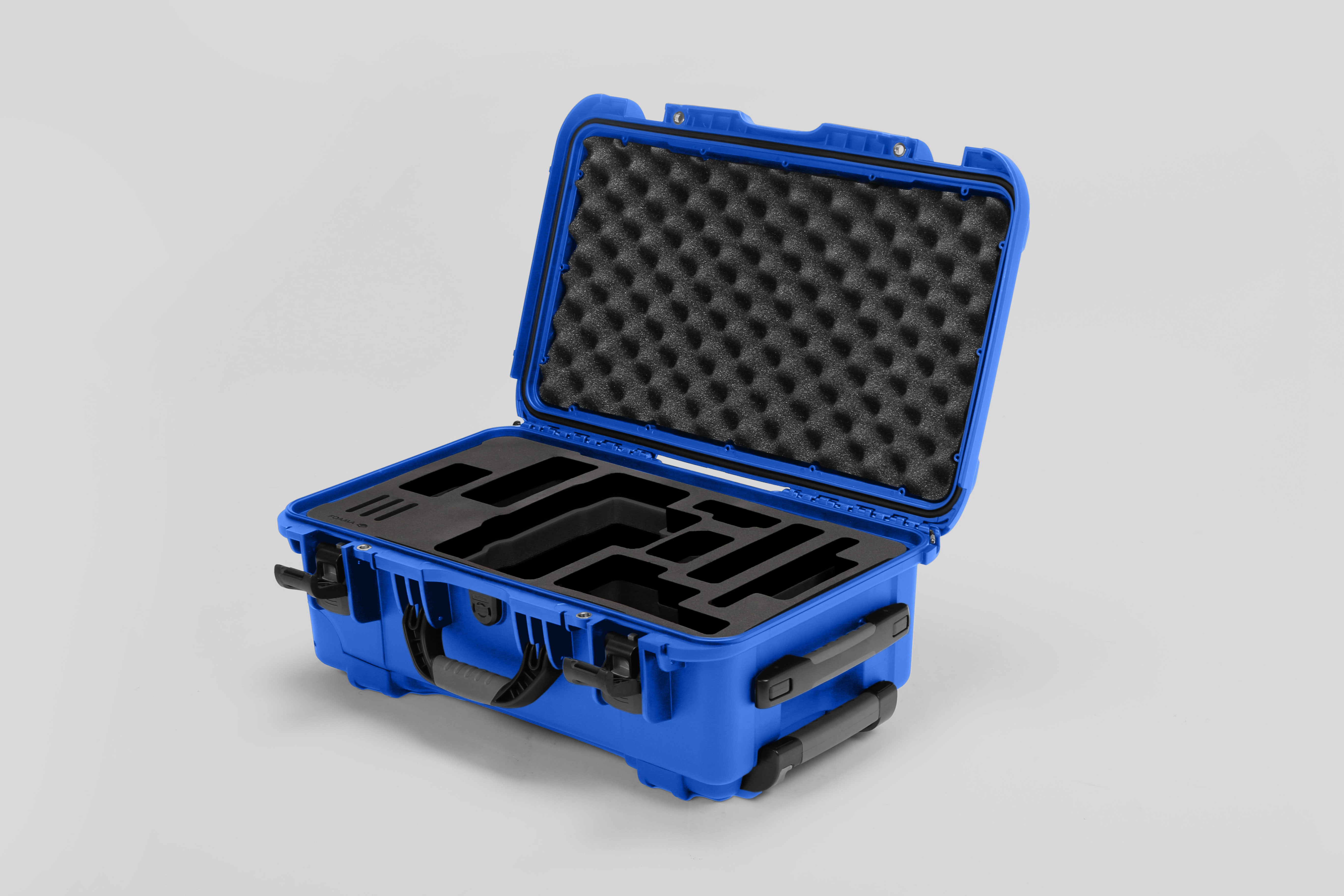 Angled view of Foama Blue Color Travel Case and Custom Foam Insert for RED Monstro