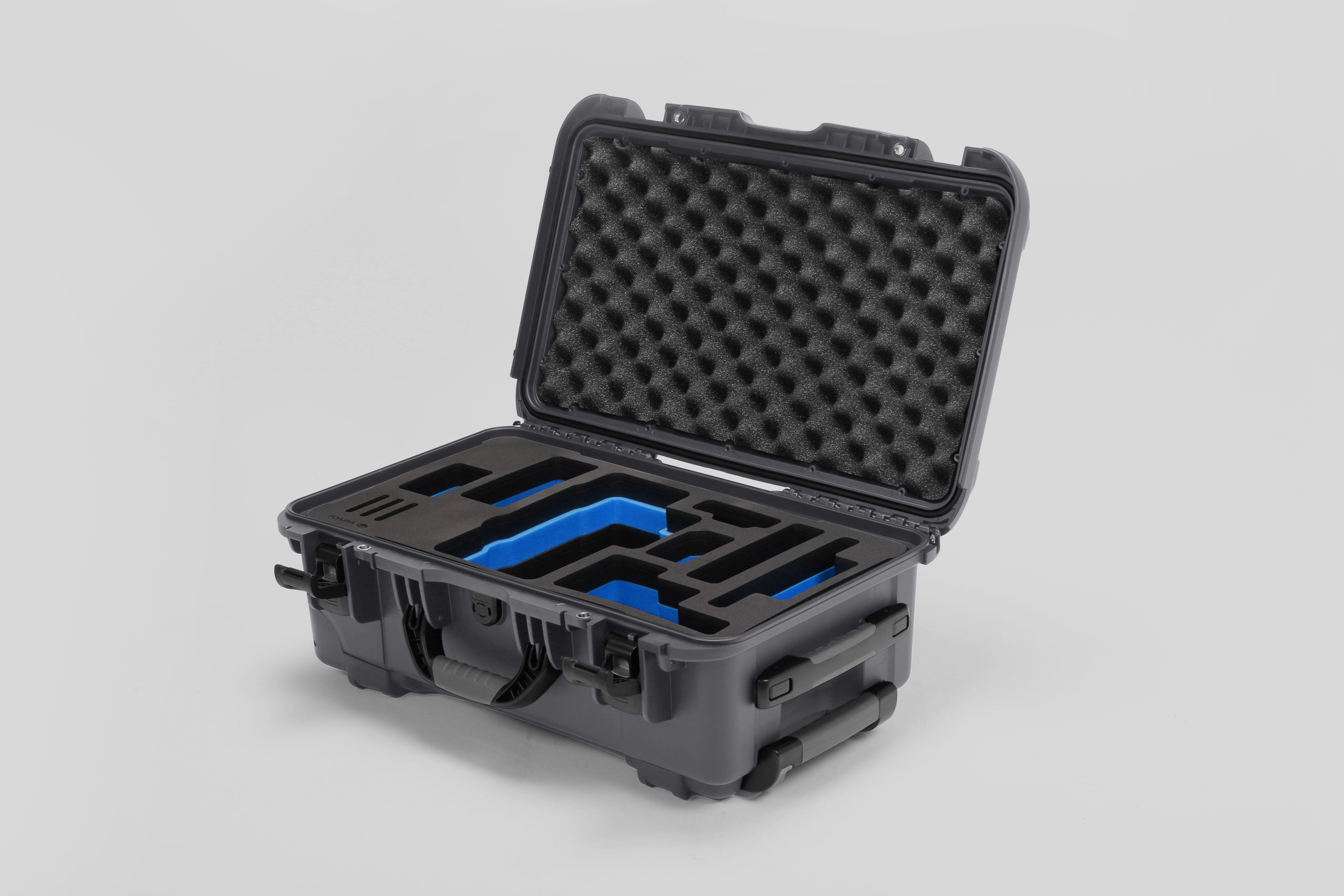 Angled view of Foama Graphite Color Travel Case and Custom Foam Insert with Blue Layer for RED Monstro