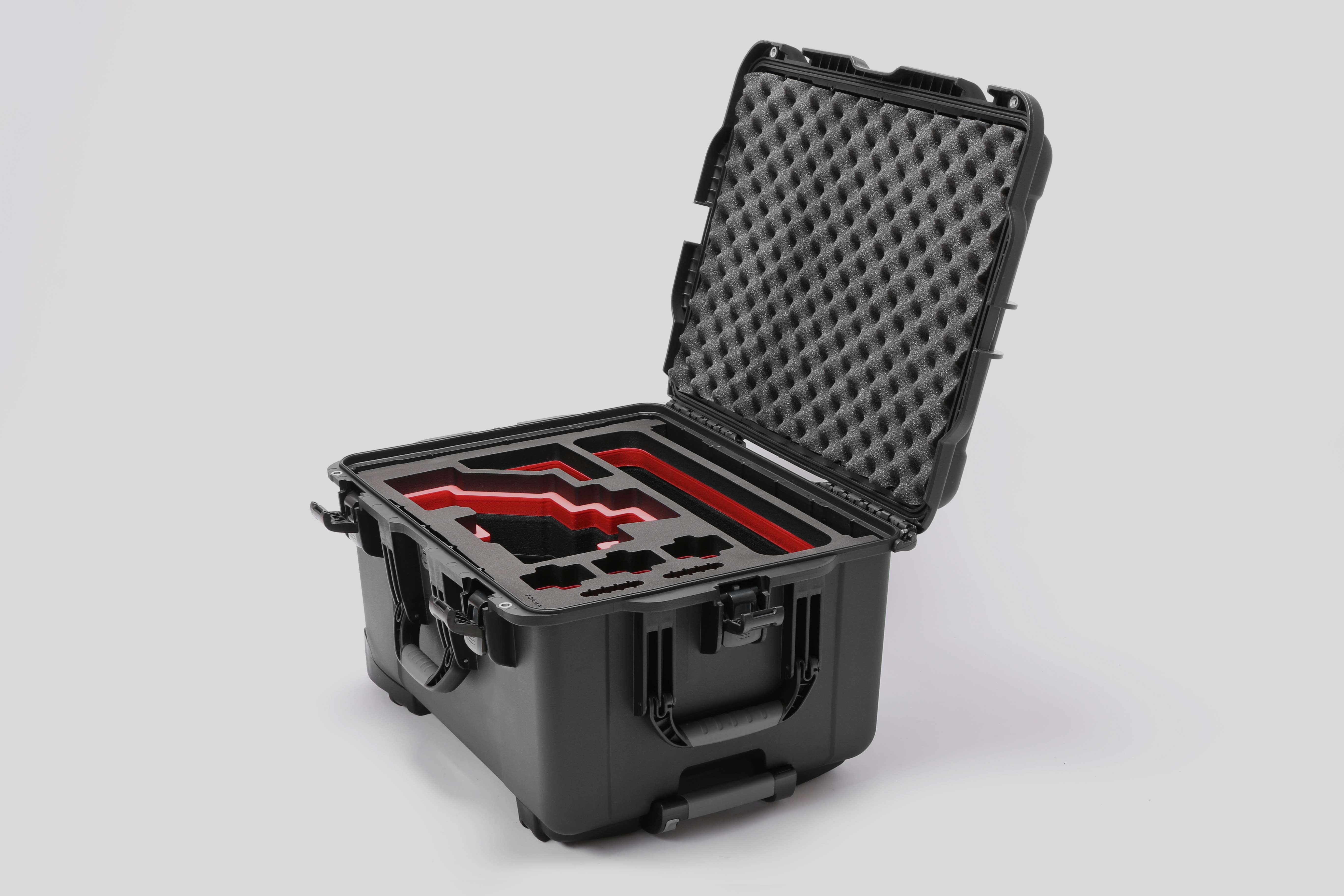 Angled view of Sony FX6 Black Color Studio Case and Custom Foam Insert with a Red Layer