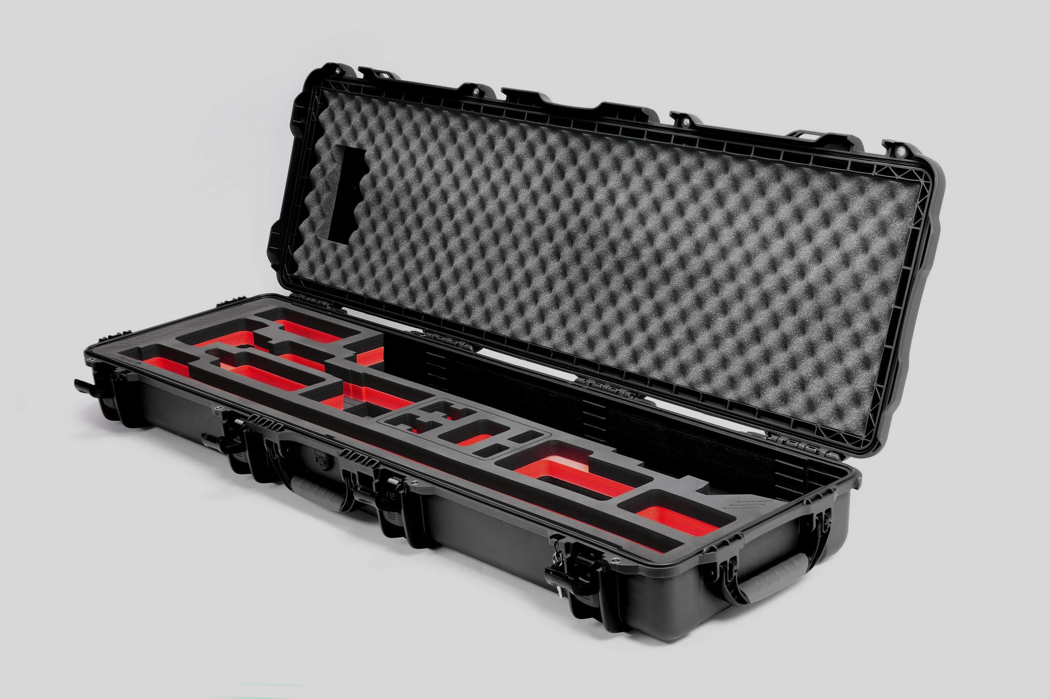 Angled view of Foama Fortified Black Color Hard Case and Custom Foam Insert with Red Layer for DJI D-RTK 2 Mobile Station