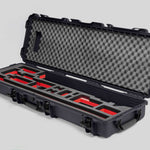 Angled view of Foama Fortified Graphite Color Hard Case and Custom Foam Insert with Red Layer for DJI D-RTK 2 Mobile Station
