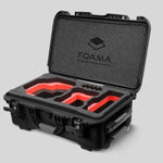 Angled view of Foama Black Color Carry-on case and Custom Foam Insert with Red Layer for RED Komodo-X
