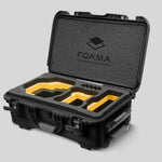 Angled view of Foama Black Color Carry-on case and Custom Foam Insert with Yellow Layer for RED Komodo-X
