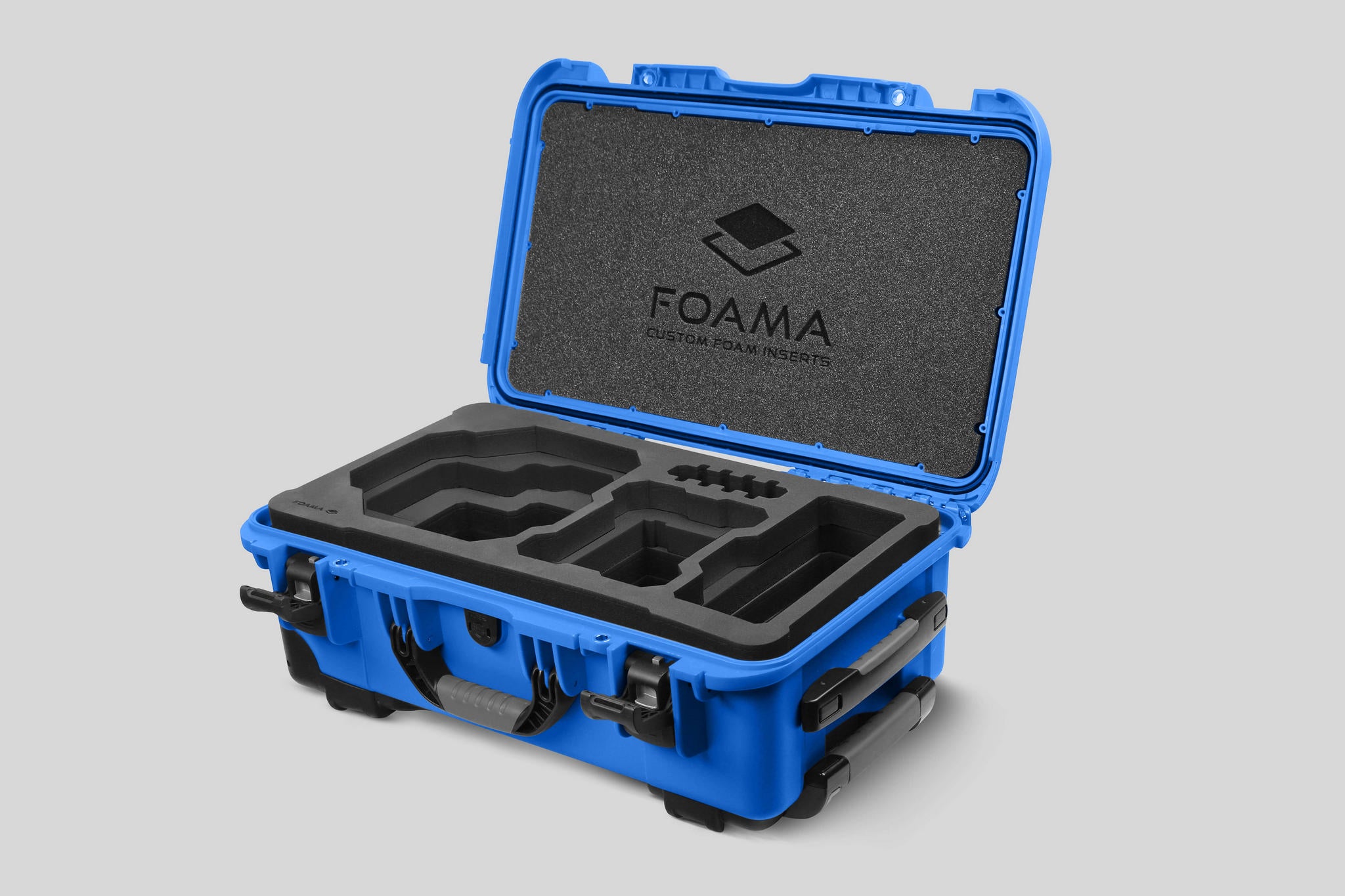 Angled view of Foama Blue Color Carry-on case and Custom Foam Insert for RED Komodo-X