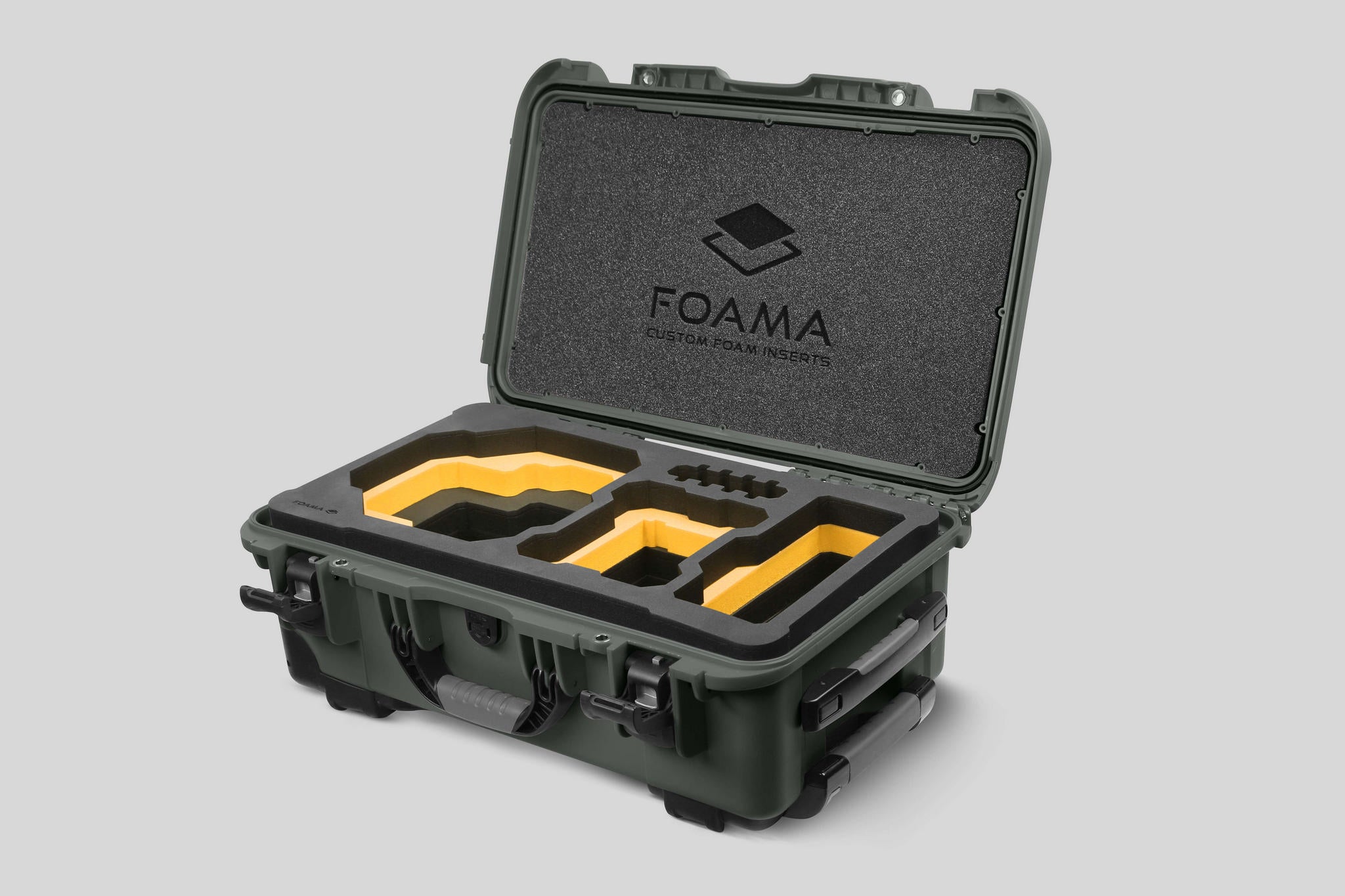 Angled view of Foama Olive Color Carry-on case and Custom Foam Insert with Yellow Layer for RED Komodo-X
