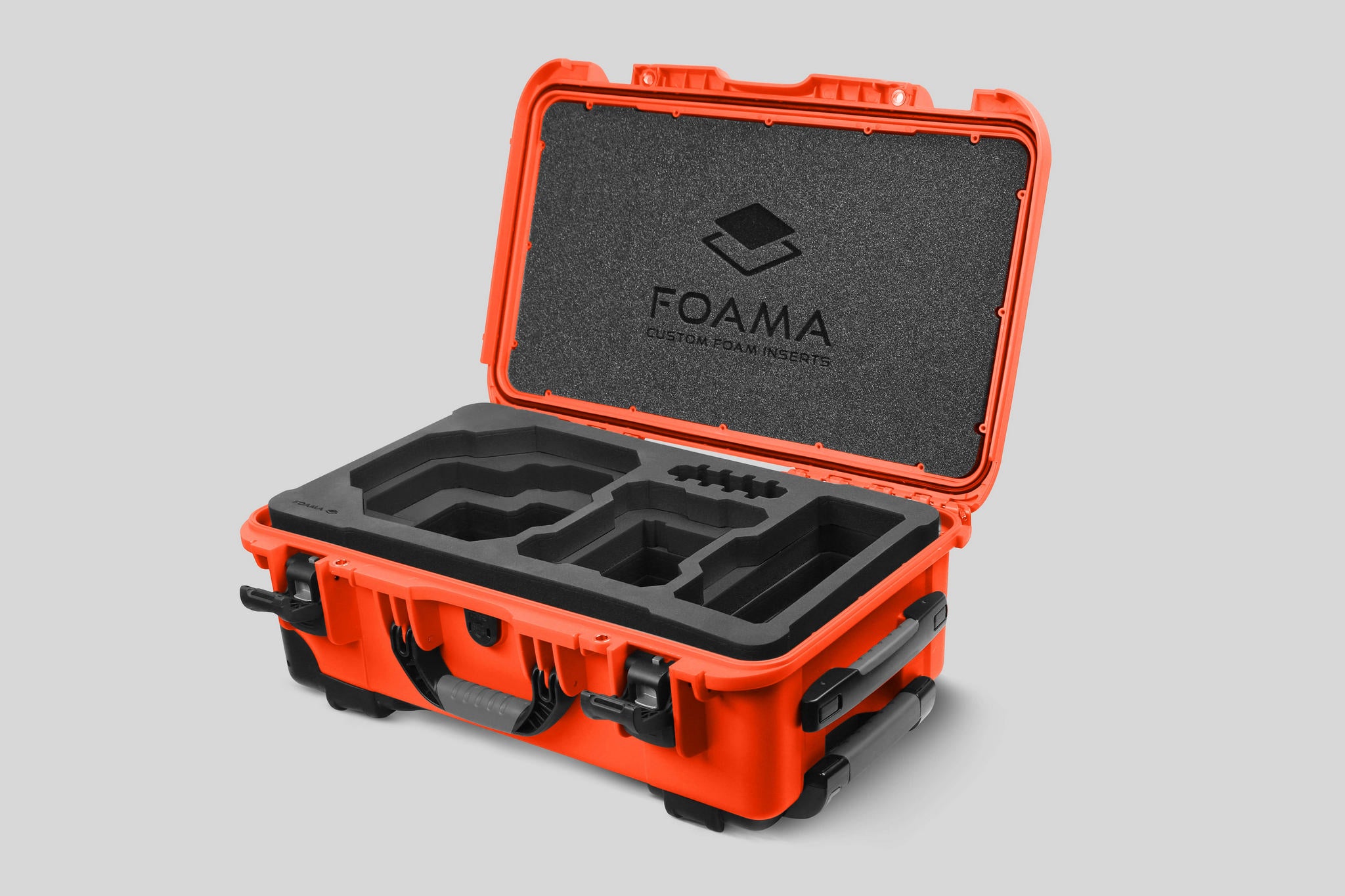 Angled view of Foama Orange Color Carry-on case and Custom Foam Insert for RED Komodo-X