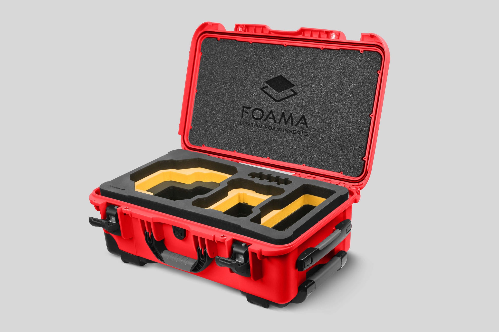 Angled view of Foama Red Color Carry-on case and Custom Foam Insert with Yellow Layer for RED Komodo-X