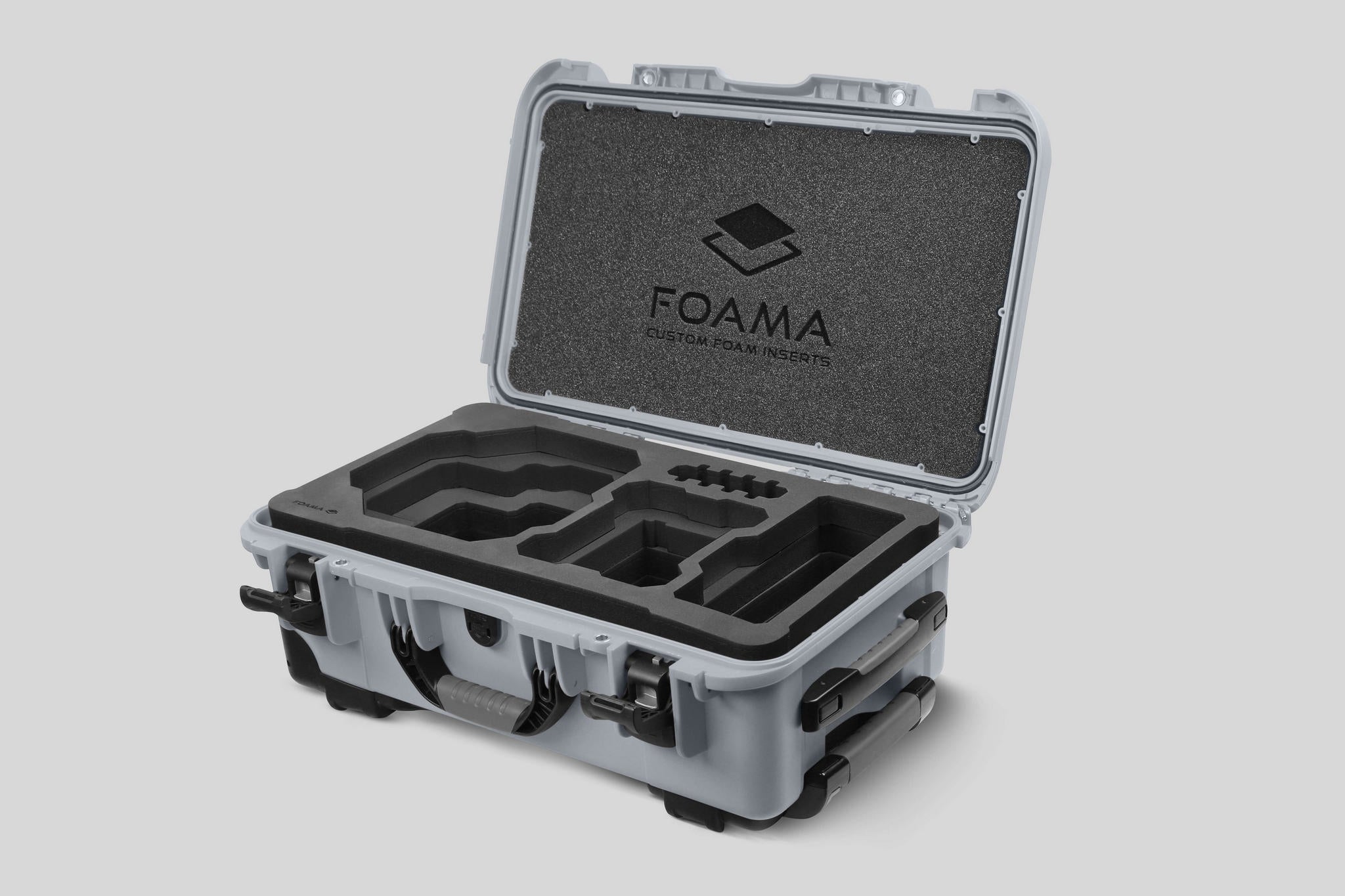 Angled view of Foama Silver Color Carry-on case and Custom Foam Insert for RED Komodo-X