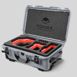Angled view of Foama Silver Color Carry-on case and Custom Foam Insert with Red Layer for RED Komodo-X