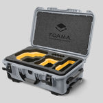 Angled view of Foama Silver Color Carry-on case and Custom Foam Insert with Yellow Layer for RED Komodo-X