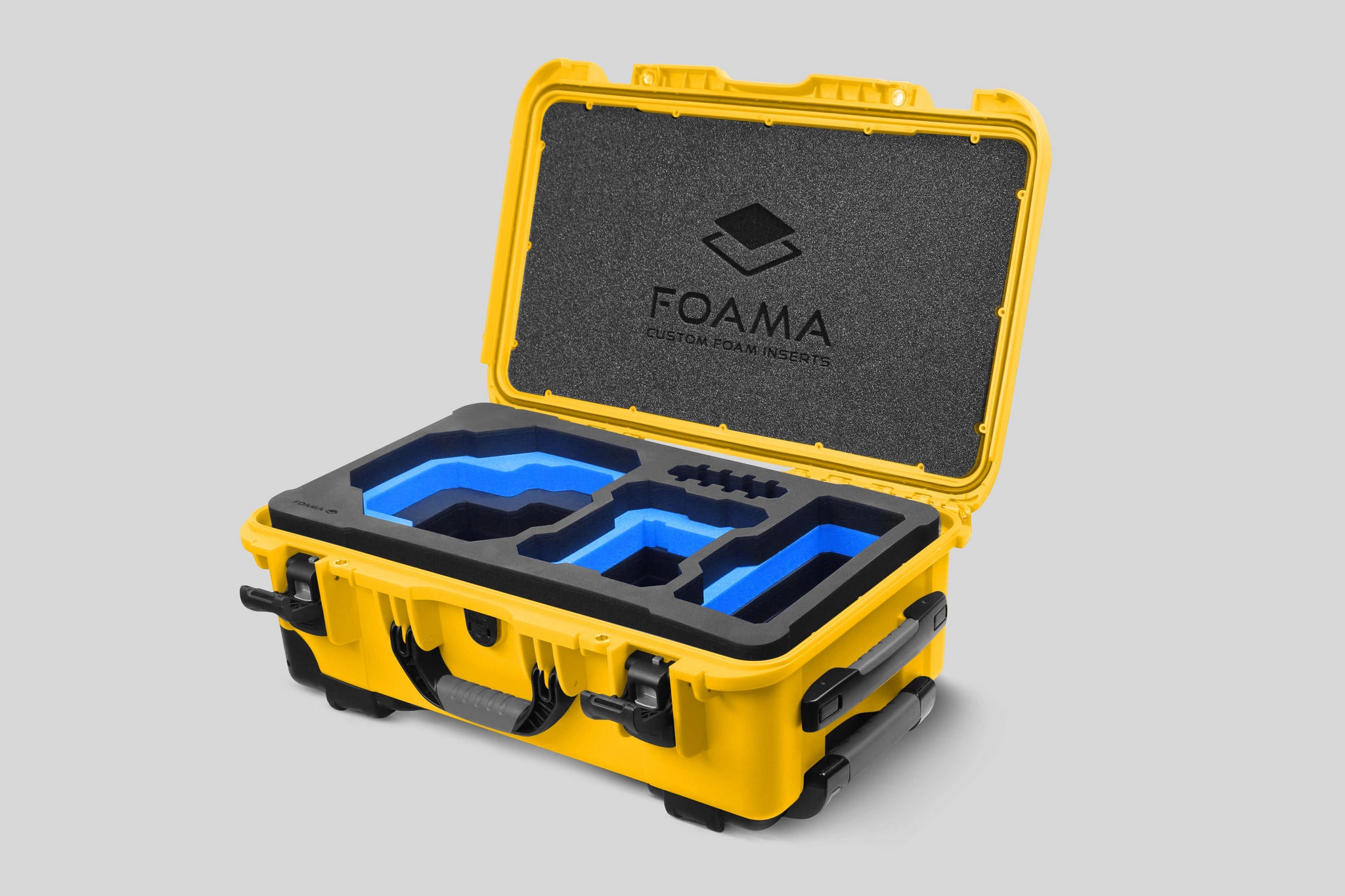 Angled view of Foama Yellow Color Carry-on case and Custom Foam Insert with Blue Layer for RED Komodo-X
