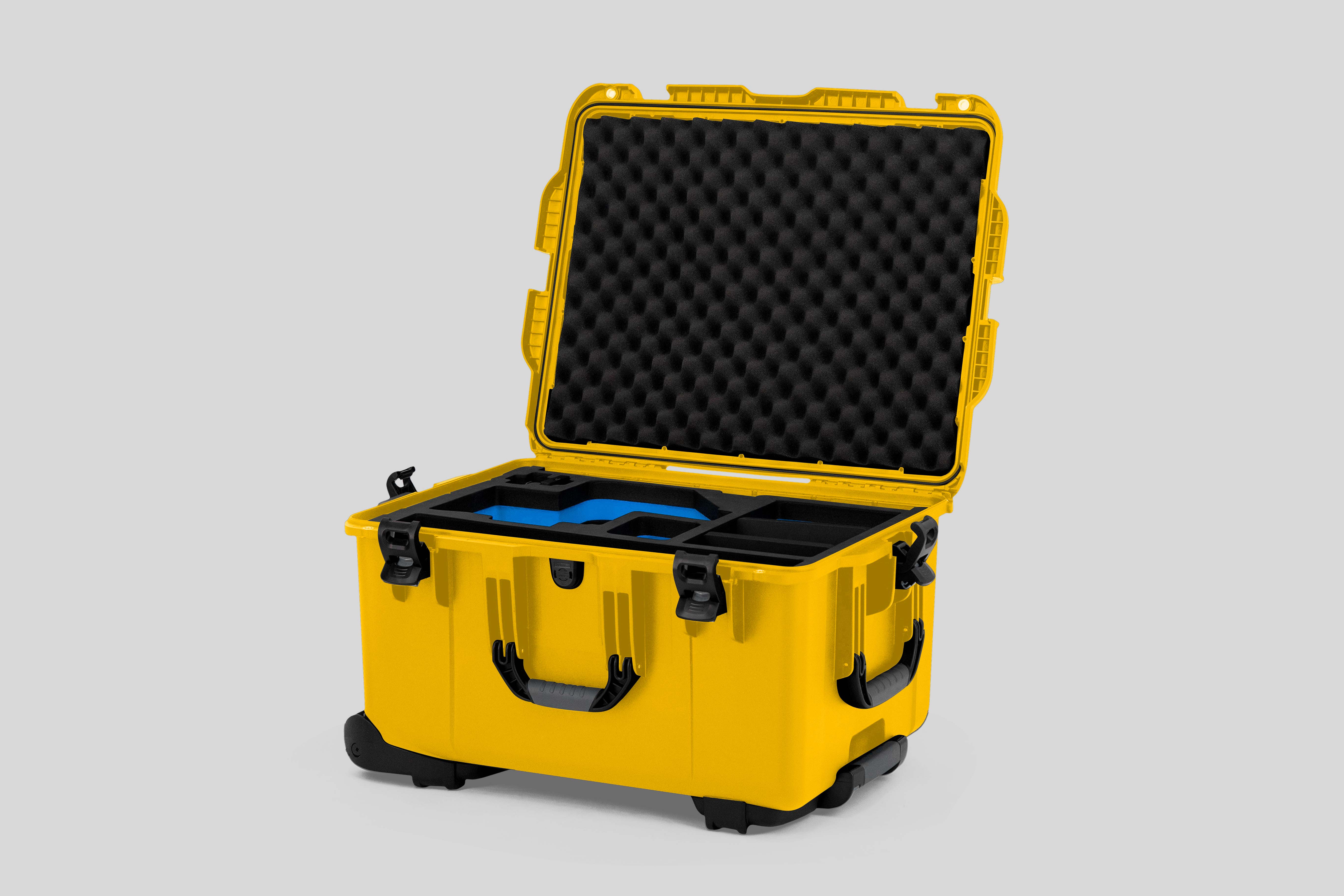 Angle view of Yellow Color Sony Burano Heavy Duty Roller Case and Custom Foam Insert with Blue Layer for Burano Camera And Accessories