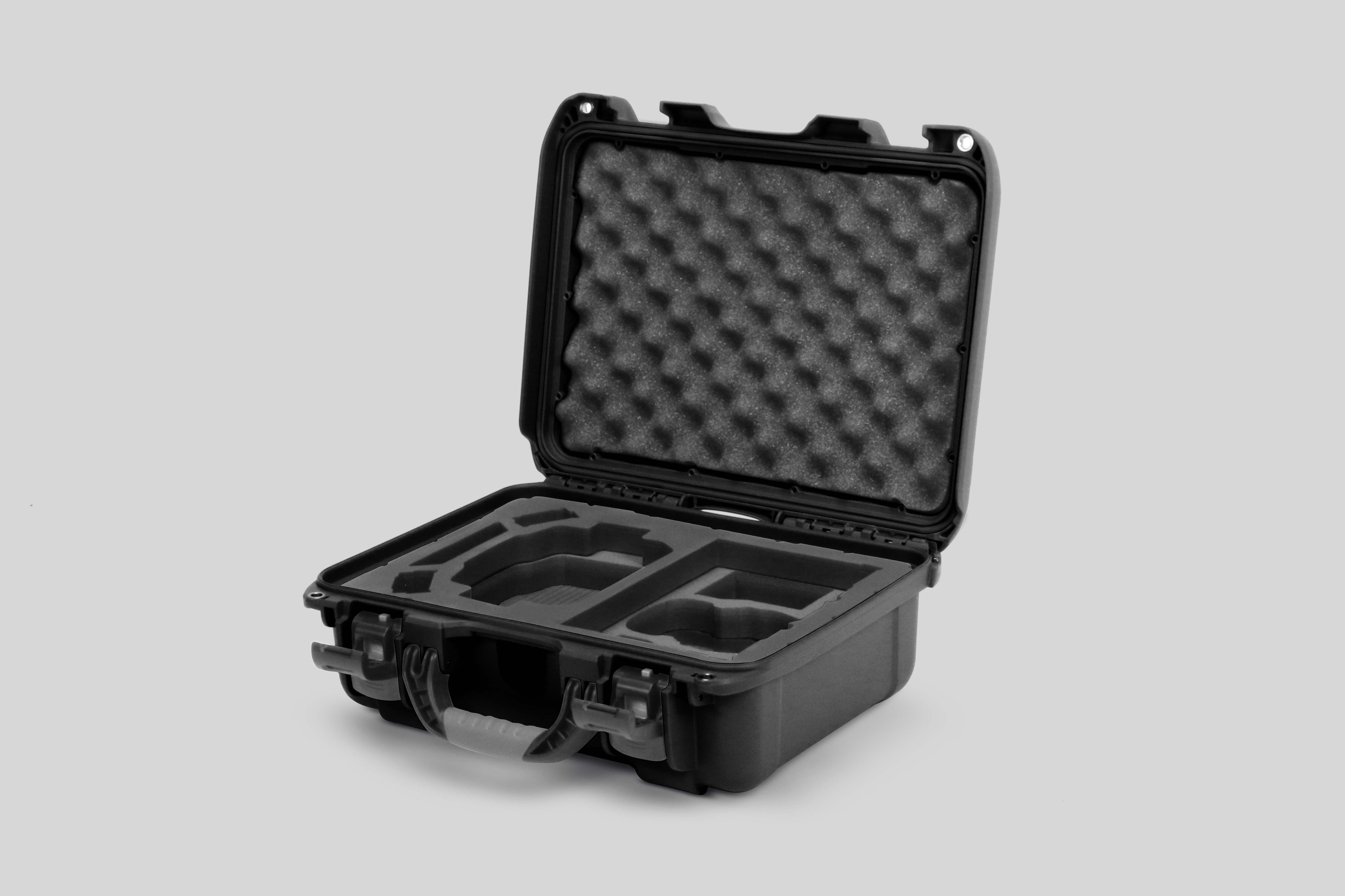 Angled View of a DJI Mini 3 & 4 Pro Black Color Hard Case with Custom Black Foam Insert