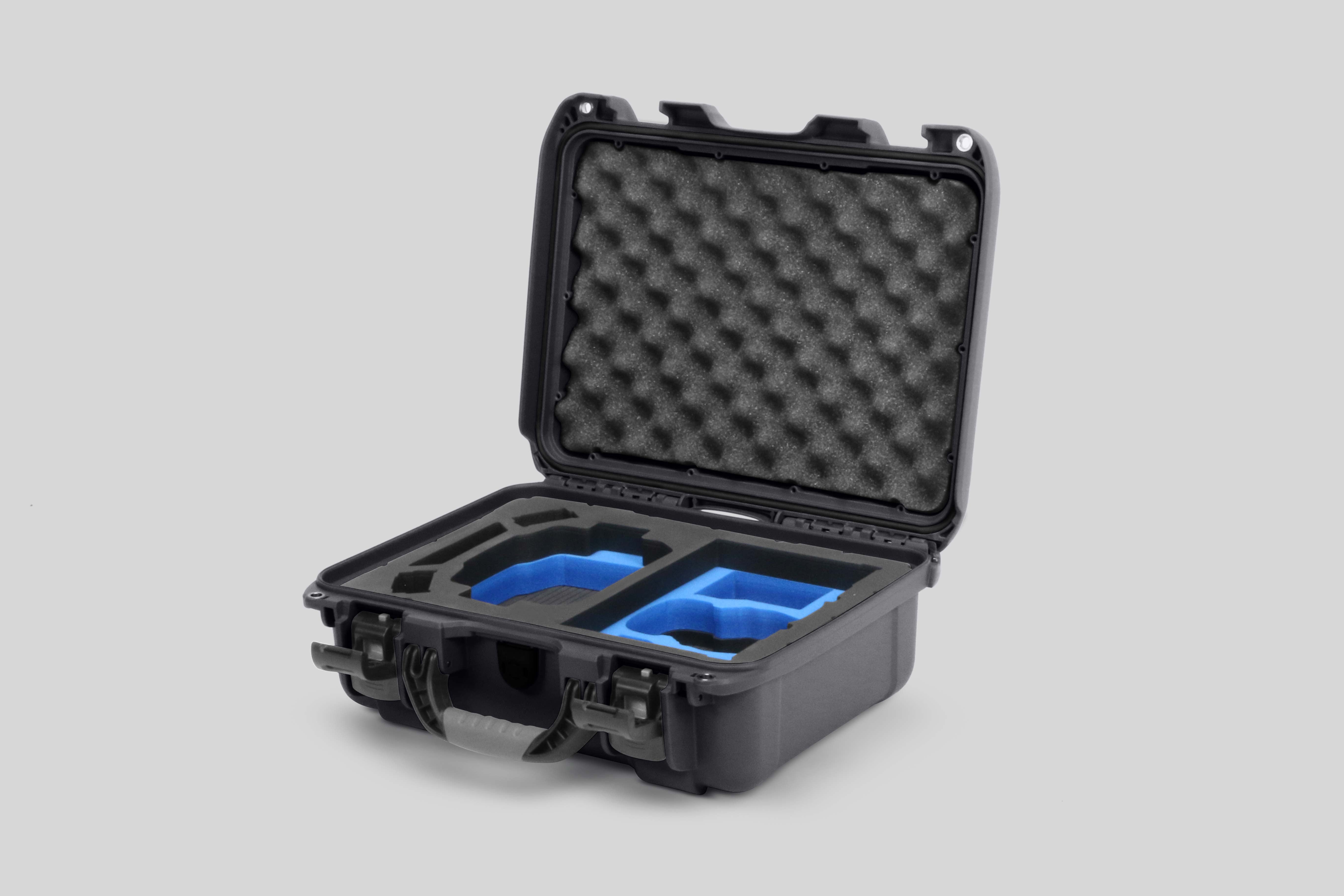 Angled view of Foama Graphite Color Hard Case and Custom Foam Insert with a Stylish Blue Layer for DJI Mini 3 & 4 Pro