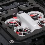 Close-up view 1 of DJI Neo Black Color Adventure Ready Compact Waterproof Carry-on Case and Custom Foam Insert with a Red Layer, holding the DJI Neo Combo