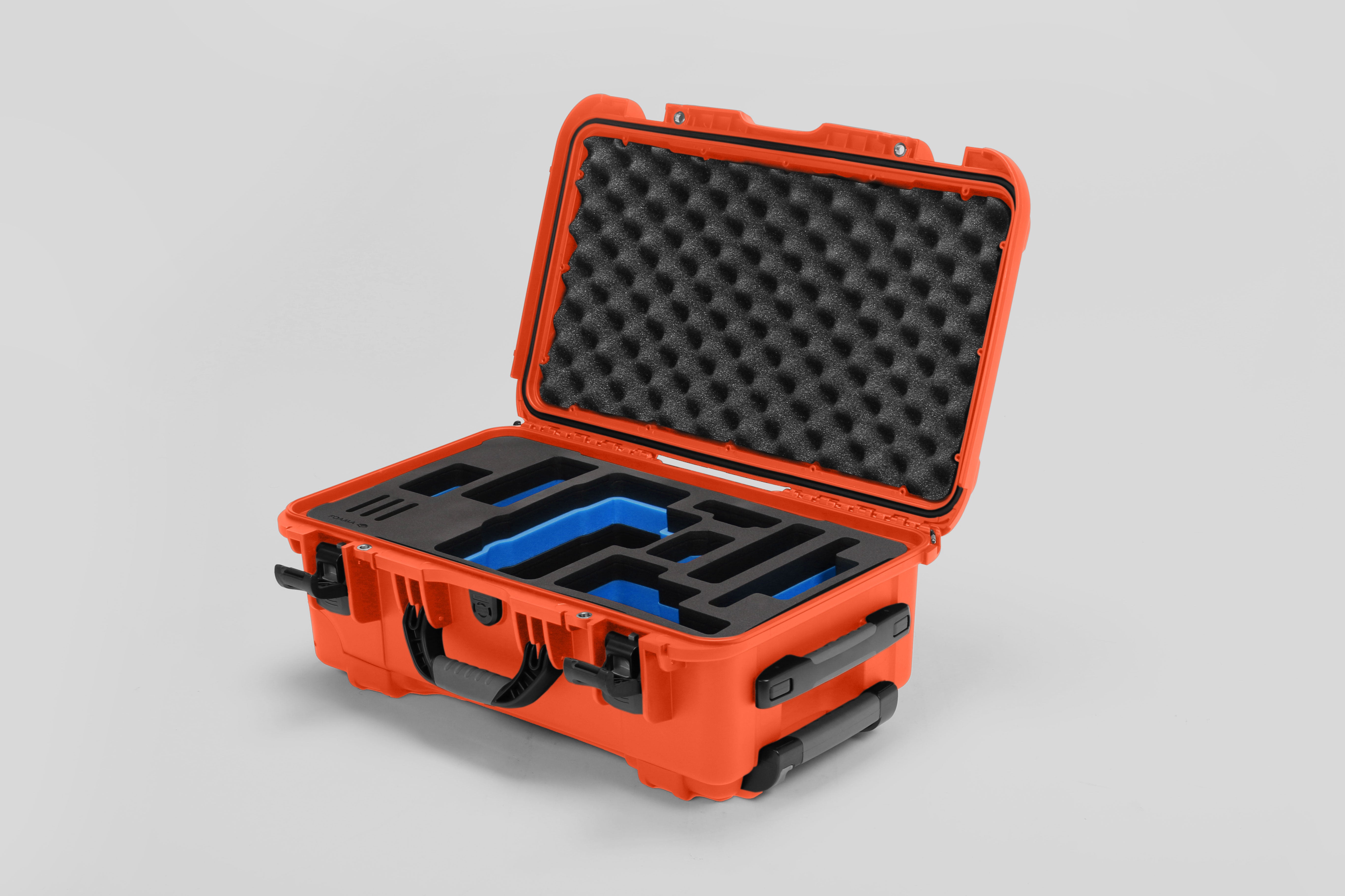 Angled view of Foama Orange Color Travel Case and Custom Foam Insert with Blue Layer for RED Monstro